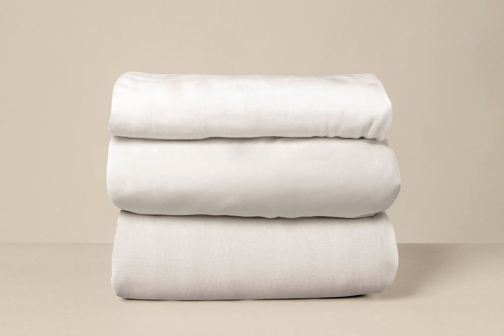 doblar ropa de cama