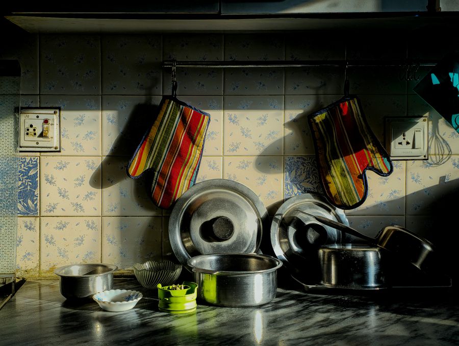 Guantes de cocina y ollas de acero inoxidable